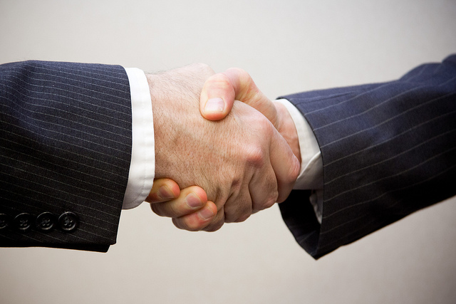 Due Diligence FAQs - Image of Handshake