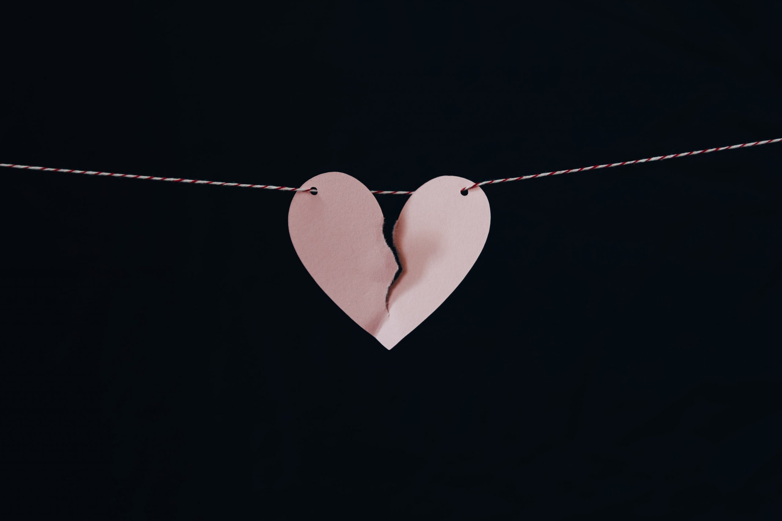 Broken Heart-Shaped Paper on a String